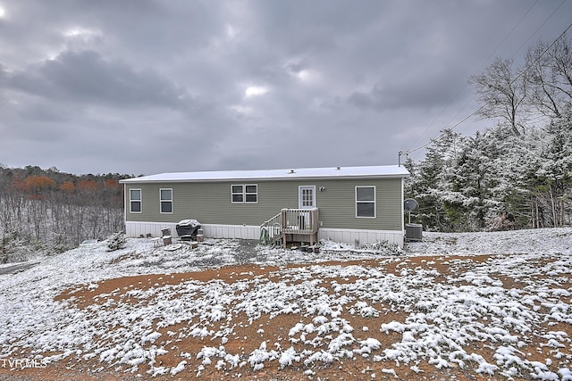 view of snow covered property