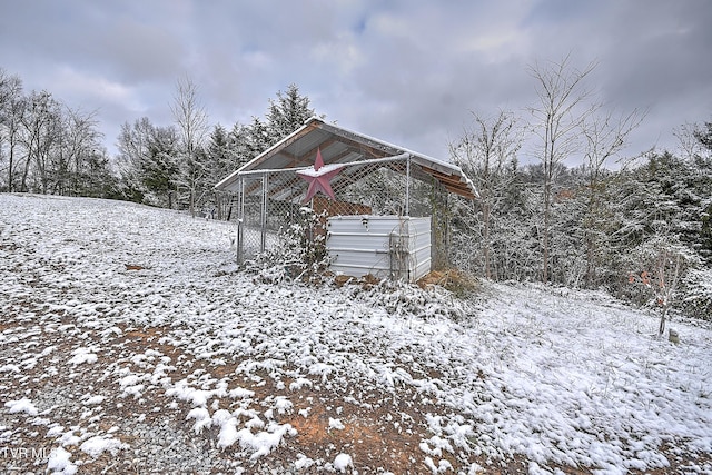 view of yard covered in snow