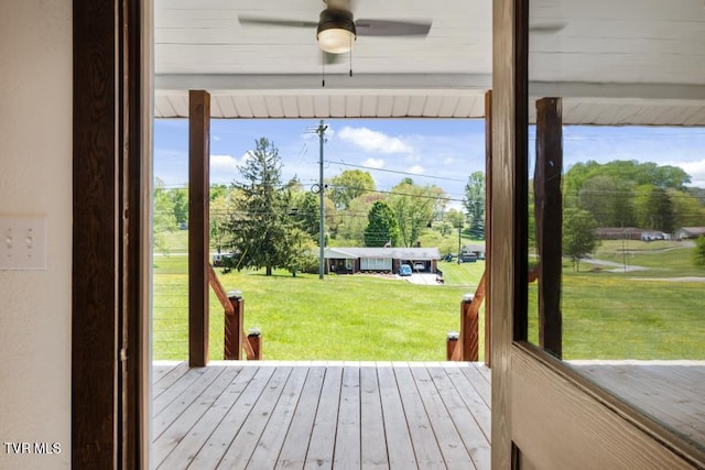 doorway featuring beam ceiling