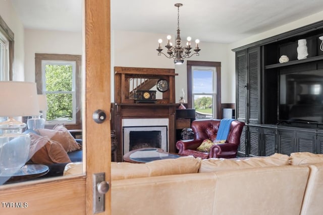 living room featuring a chandelier