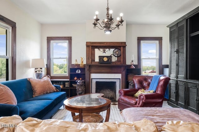 living room with wood-type flooring and an inviting chandelier