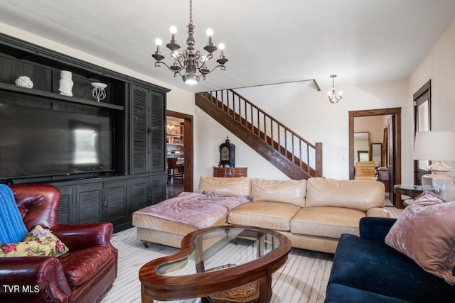 living room with a notable chandelier