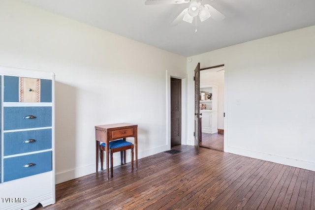 interior space featuring dark hardwood / wood-style flooring and ceiling fan