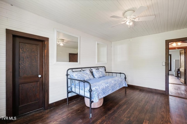 bedroom featuring hardwood / wood-style floors and ceiling fan