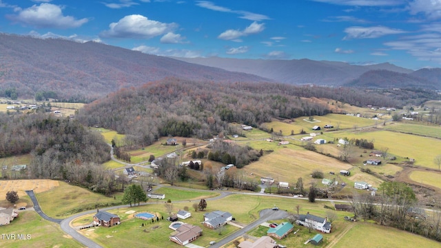 birds eye view of property featuring a rural view and a mountain view