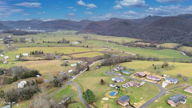 aerial view featuring a rural view and a mountain view