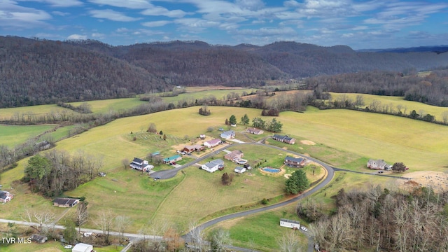 aerial view featuring a mountain view and a rural view