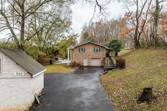 view of side of home featuring a garage