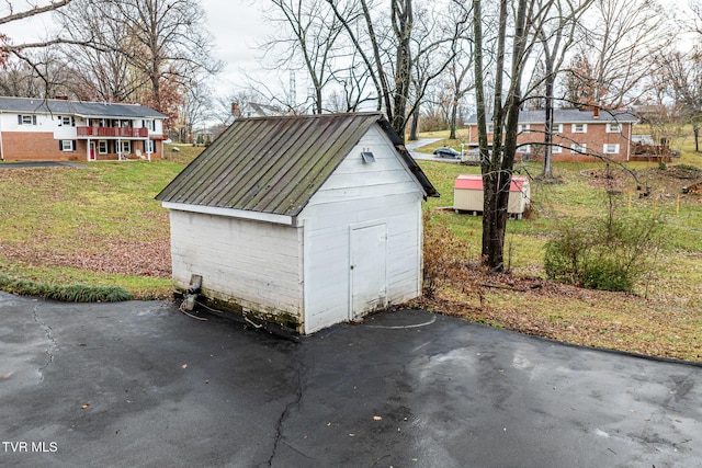 garage with a yard