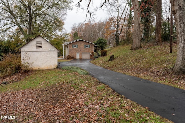 view of property exterior featuring a garage