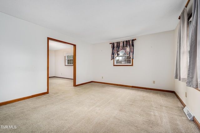 view of carpeted spare room