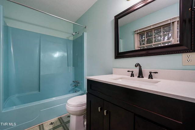 full bathroom featuring toilet, vanity, a textured ceiling, and washtub / shower combination