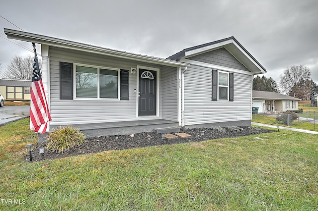 view of front of property with a front lawn