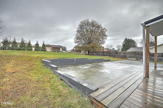 deck featuring a lawn