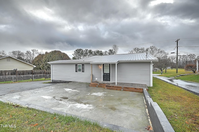 exterior space featuring a yard and a patio area