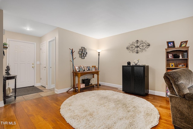 sitting room featuring hardwood / wood-style flooring