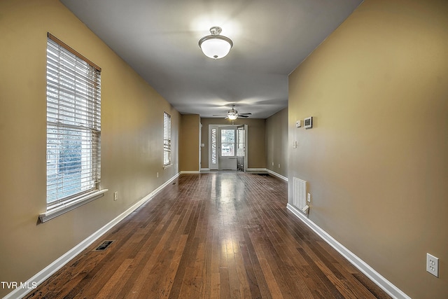 interior space with dark hardwood / wood-style floors