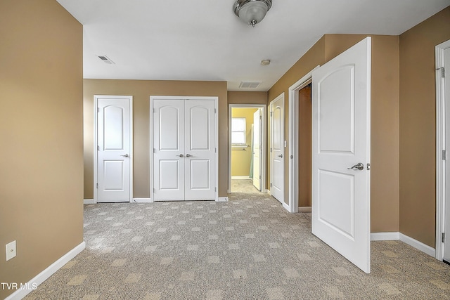 unfurnished bedroom with carpet