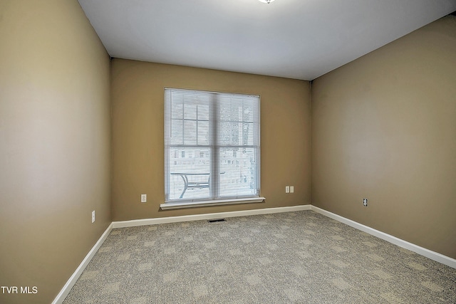 view of carpeted empty room