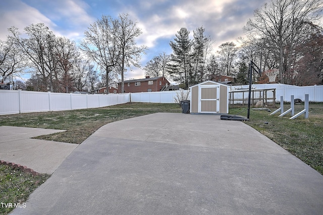 view of patio featuring a storage shed