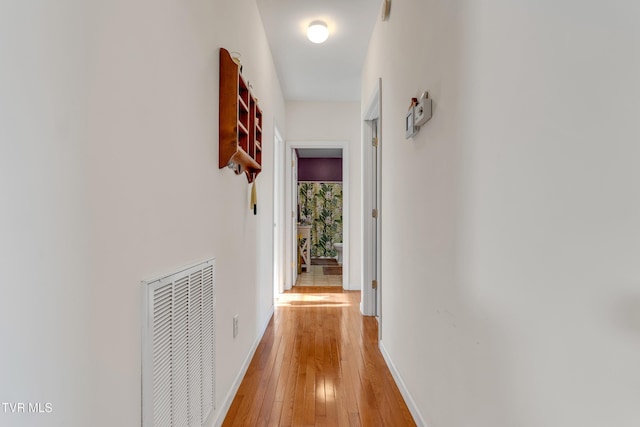 hall featuring light hardwood / wood-style flooring