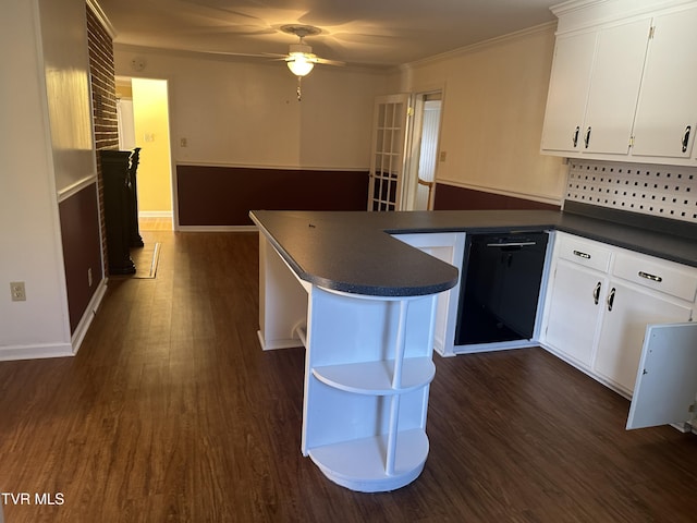 kitchen featuring crown molding, ceiling fan, black dishwasher, dark hardwood / wood-style flooring, and white cabinetry