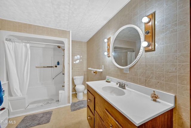 bathroom with a shower with curtain and tile walls