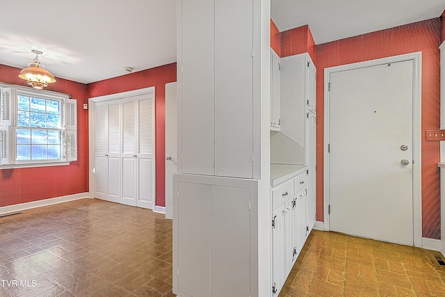 kitchen with white cabinetry