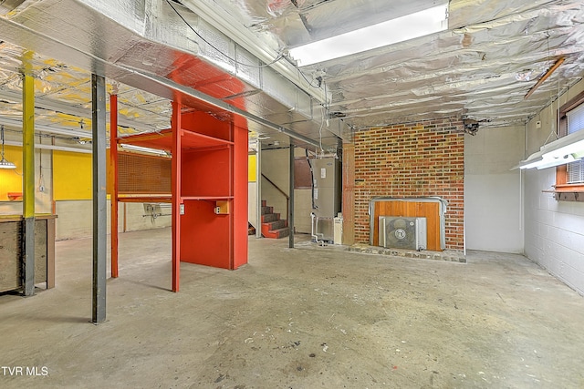 basement featuring a fireplace and heating unit