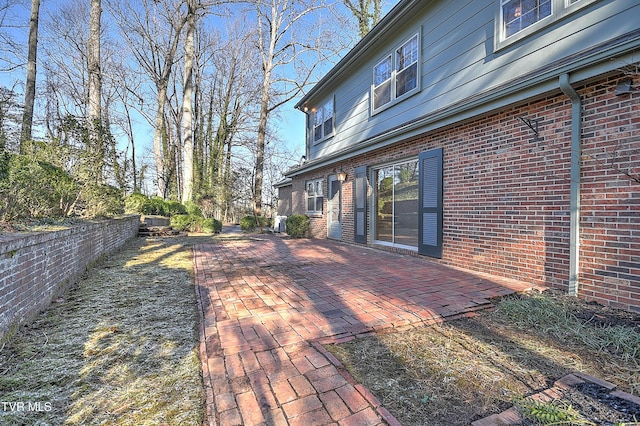 wooden deck featuring a patio area