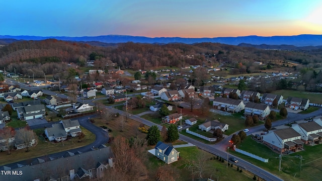 aerial view at dusk with a mountain view