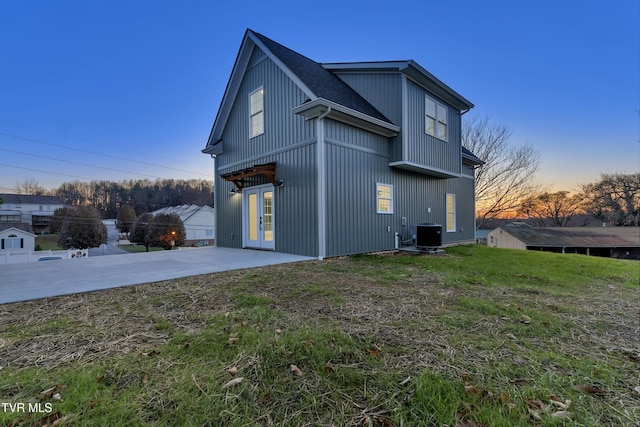 property exterior at dusk with central AC