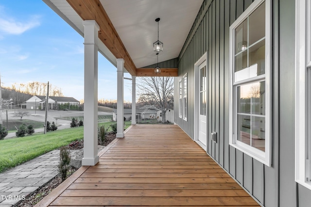 wooden deck with a yard