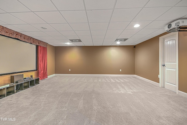 cinema featuring carpet flooring and a drop ceiling