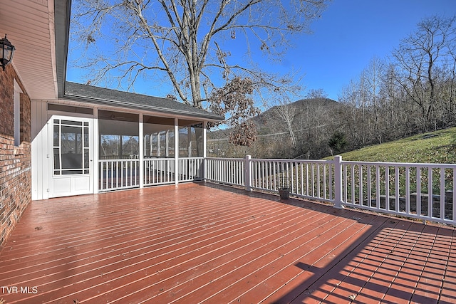 wooden terrace featuring a mountain view