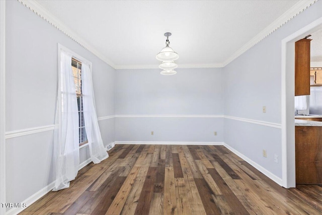 unfurnished dining area featuring dark wood-type flooring and crown molding