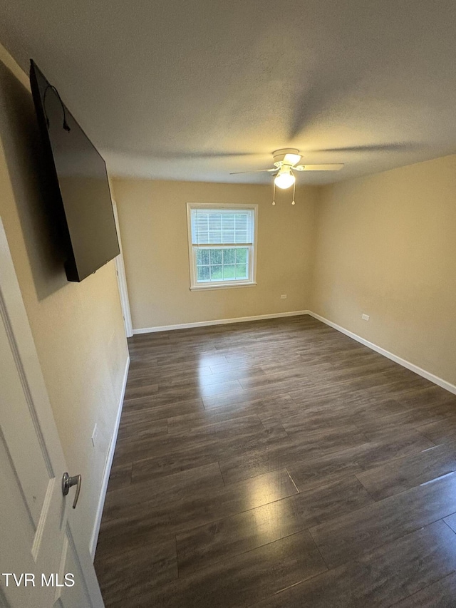 311 Dry Fork Rd, Del Rio, TN 37727 - empty room with dark wood finished floors and ceiling fan