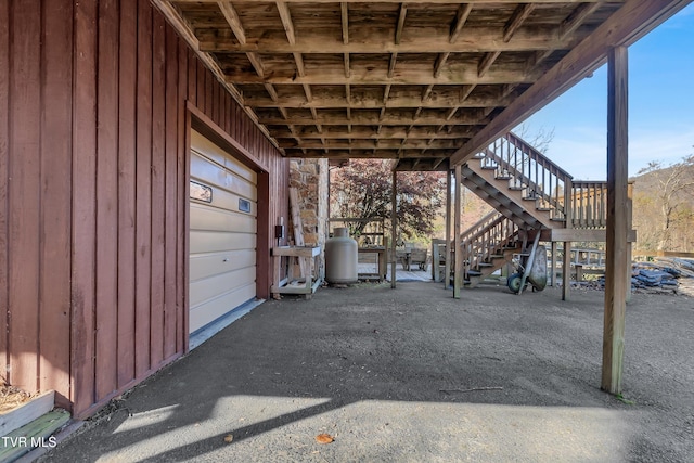 view of patio featuring a garage