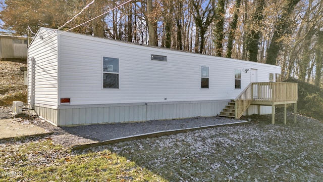 view of home's exterior with a deck