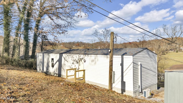 view of home's exterior featuring ac unit