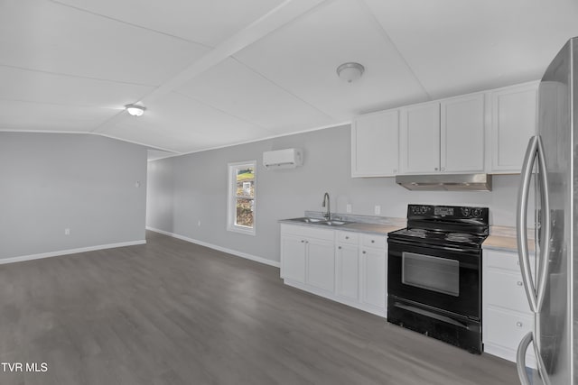 kitchen featuring a wall mounted AC, sink, electric range, white cabinetry, and stainless steel refrigerator