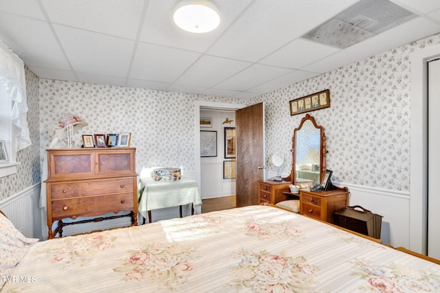 bedroom featuring a drop ceiling