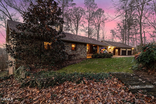 view of front of property with a lawn