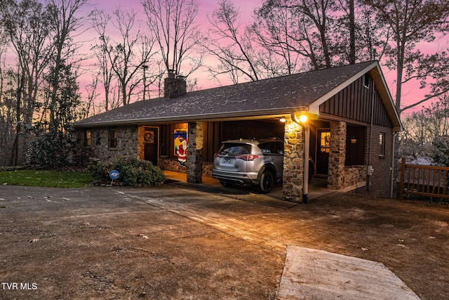 single story home featuring a garage