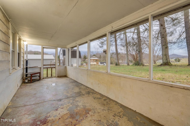 unfurnished sunroom with a healthy amount of sunlight