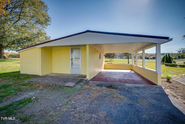 exterior space featuring a lawn