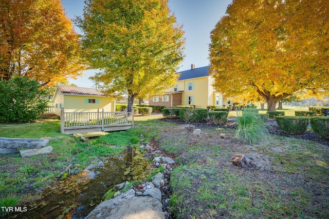 view of yard featuring a deck