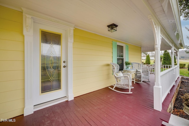 deck featuring covered porch