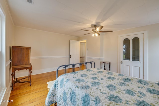 bedroom featuring ceiling fan and light hardwood / wood-style floors