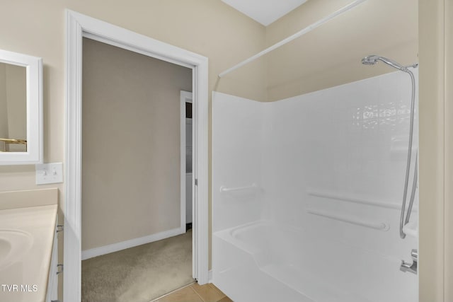 bathroom with tile patterned floors, vanity, and shower / bath combination